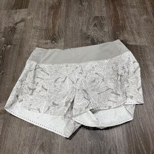 Athleta Green Laser Cut Running Shorts